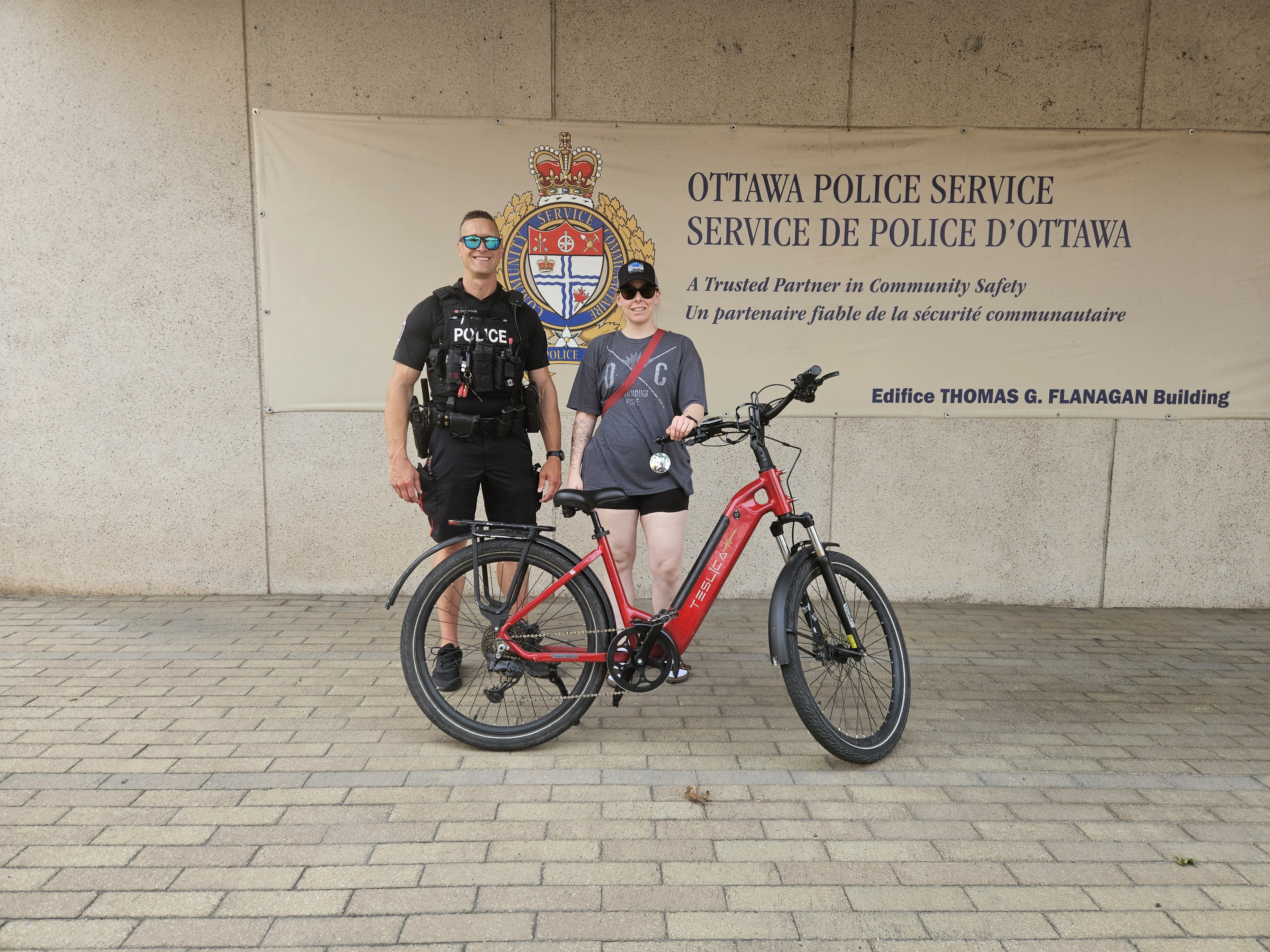Constable Thompson returns a stolen e-bike to its owner