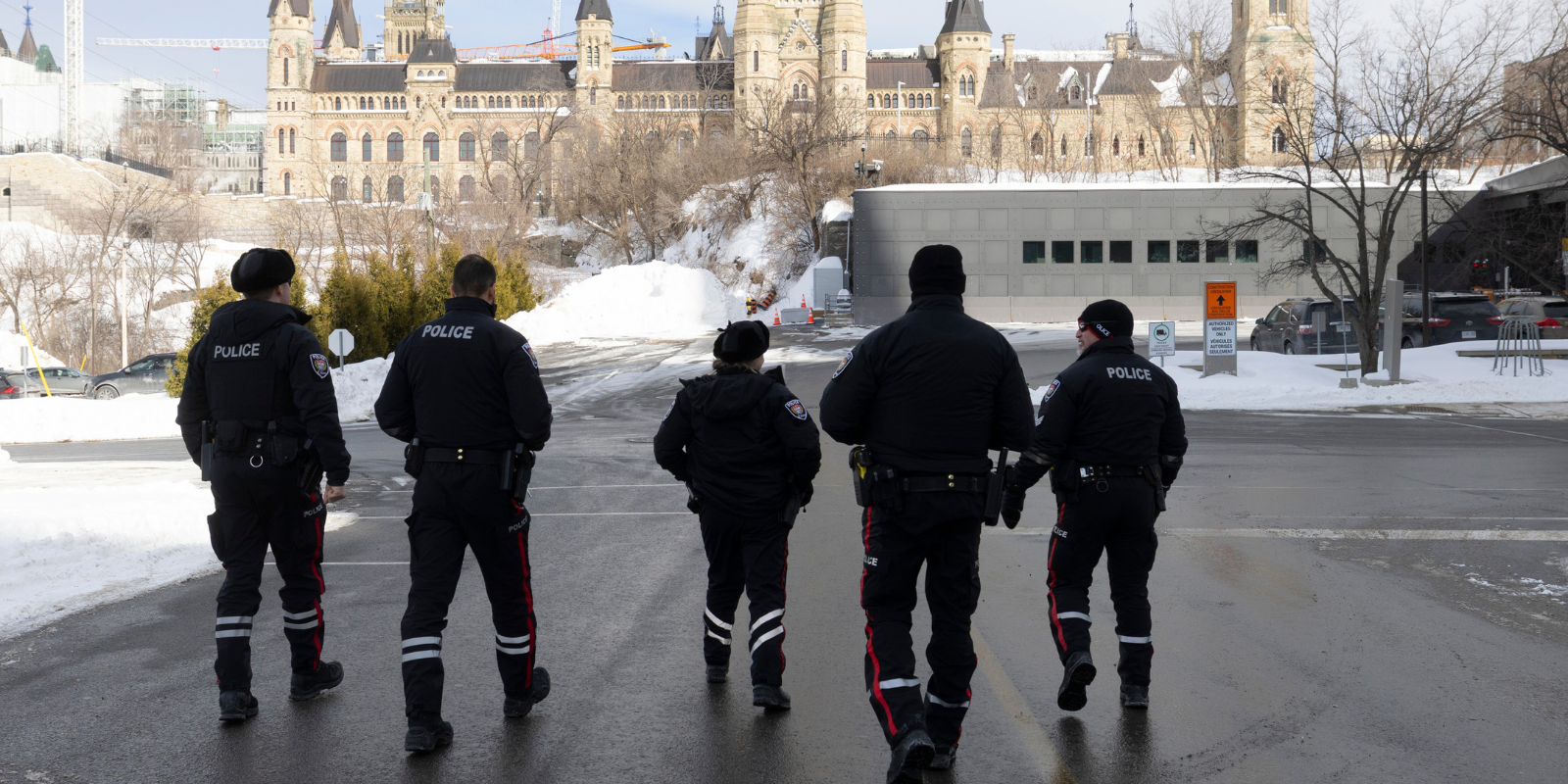 Officers in front of Parliament Hill