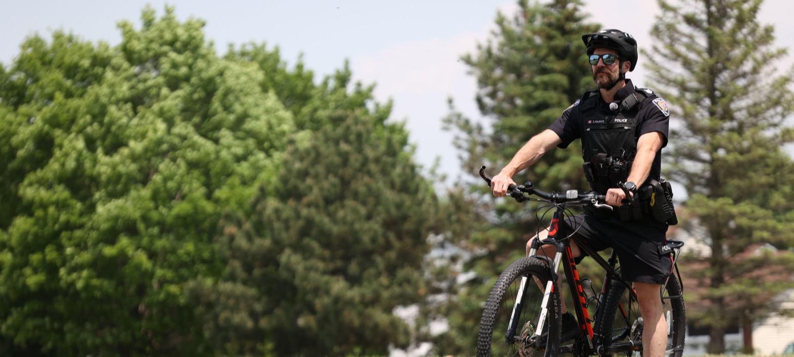 Police officer on a bike.