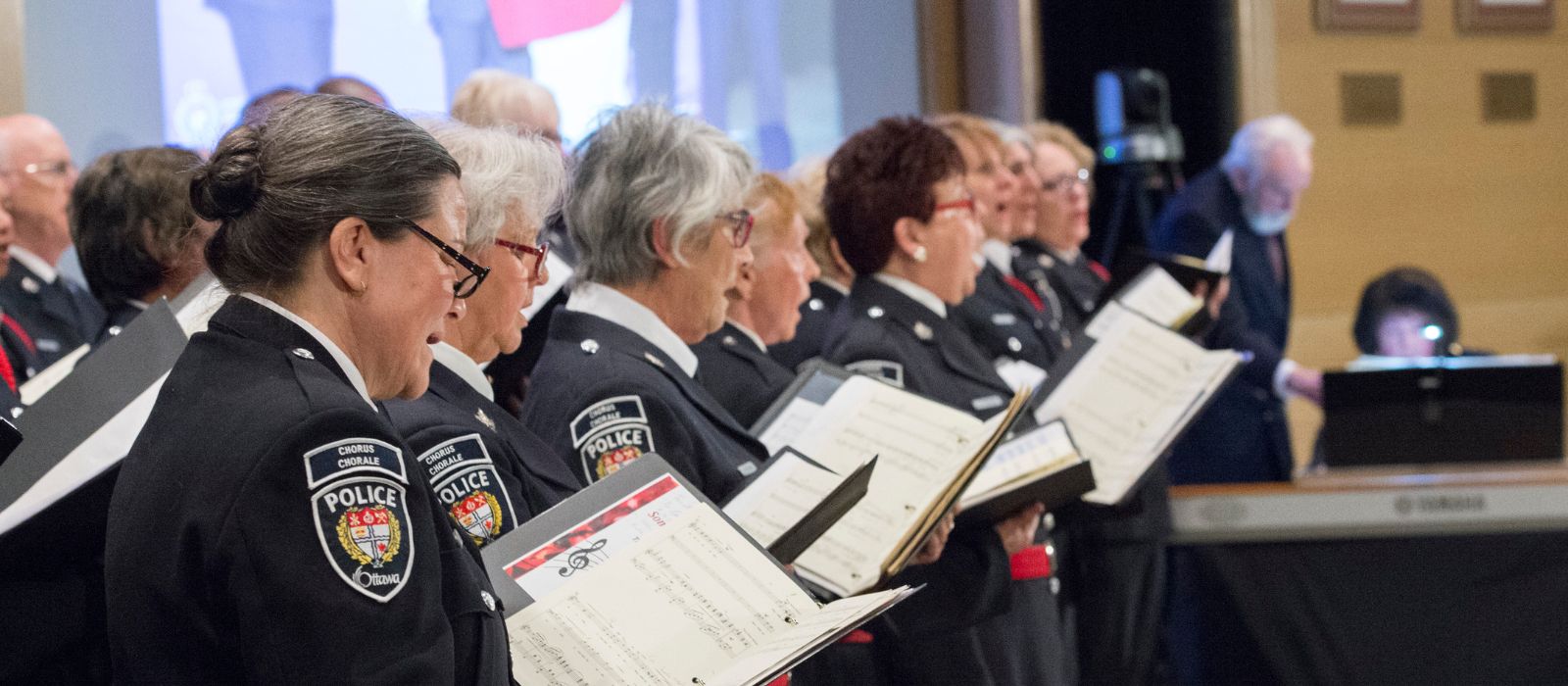 Members of the Ottawa Police Chorus singing.