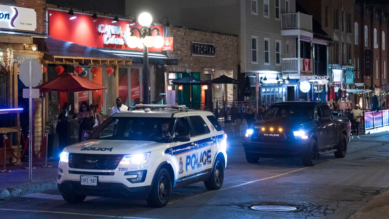 A police cruiser and pick up truck in the ByWard Market