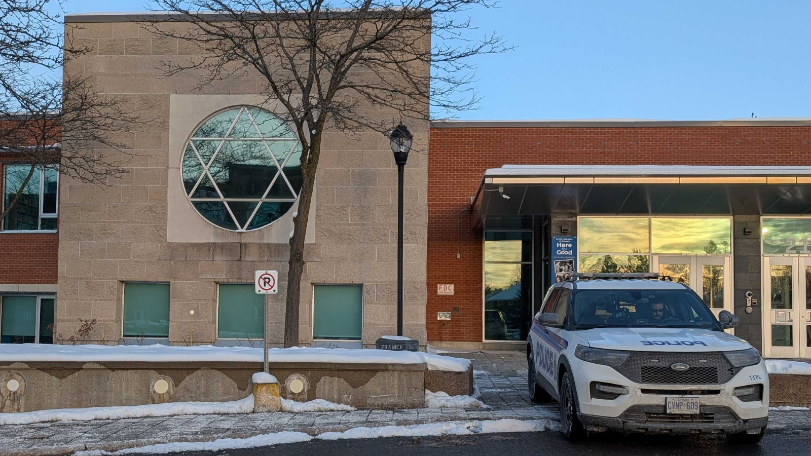 Ottawa Police cruiser parked outside religious institution