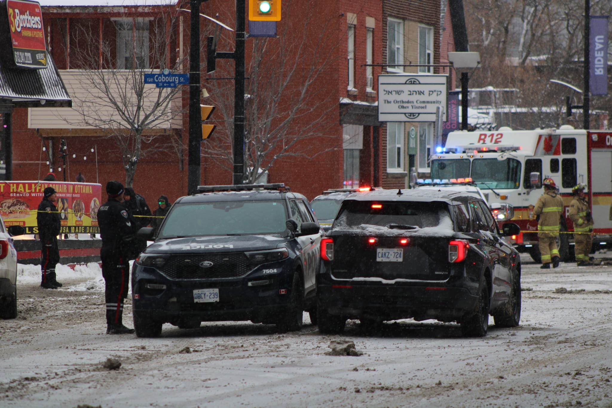 Officers at the scene of a fatal collision on Rideau Street
