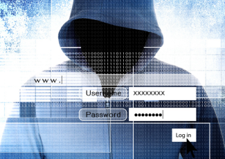Fraud – Identity theft: a hooded figure stands behind a login screen.