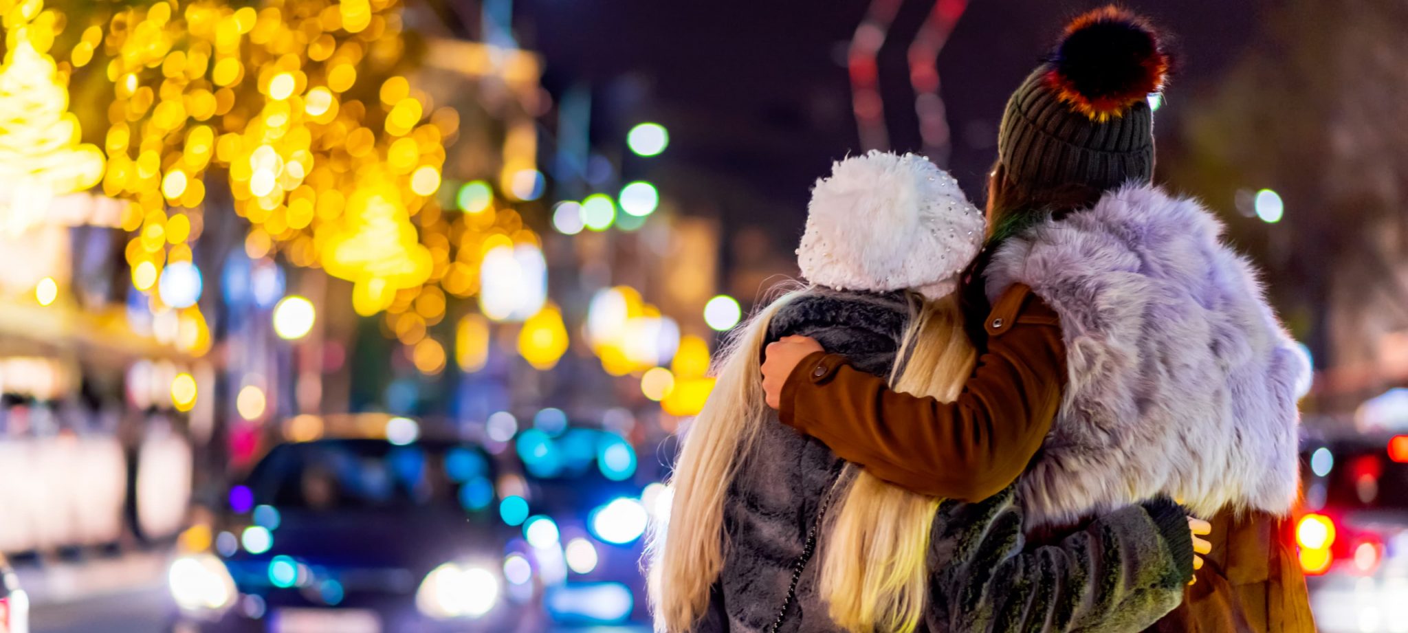 Photo of two people outside in the winter
