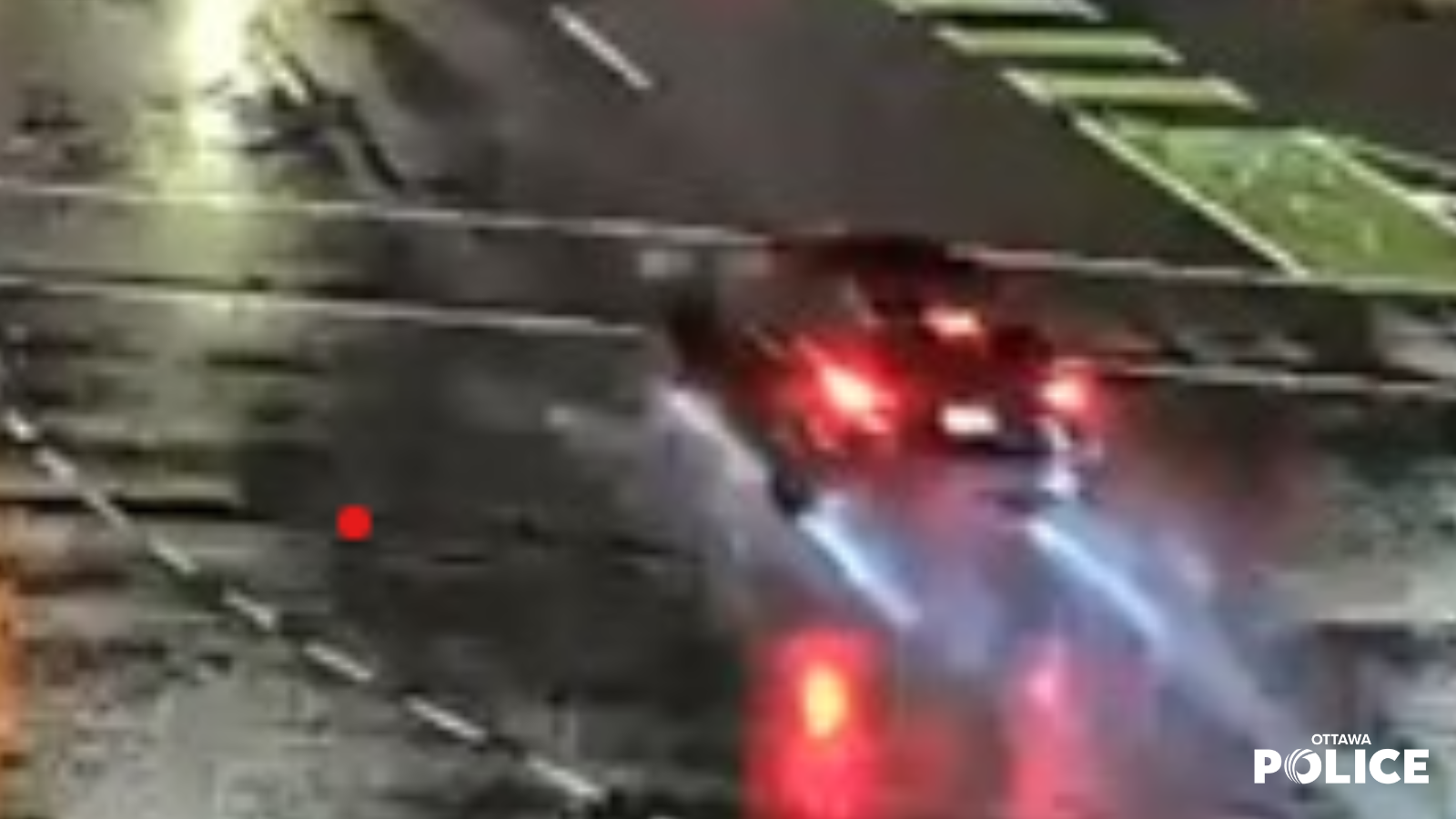 Dark-coloured Ford Escape with front-end damage, specifically on the right-side fog light area