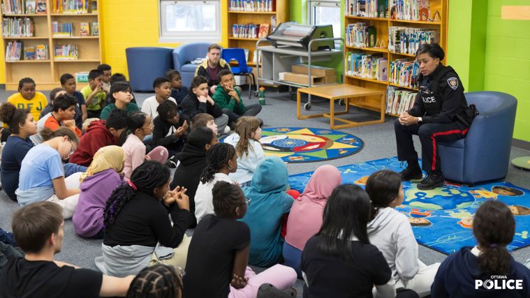 Cst. Cst. Fern John-Simon attended Dr. F.J. McDonald School to read to the students and share her story for Black History Month.