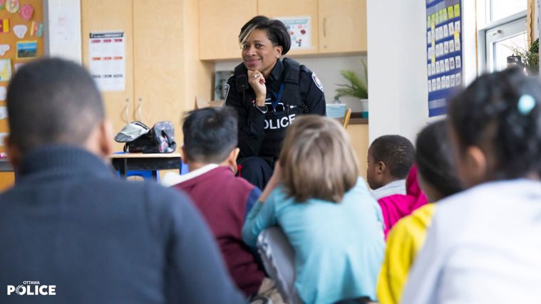 Cst. Cst. Fern John-Simon attended Dr. F.J. McDonald School to read to the students and share her story for Black History Month.